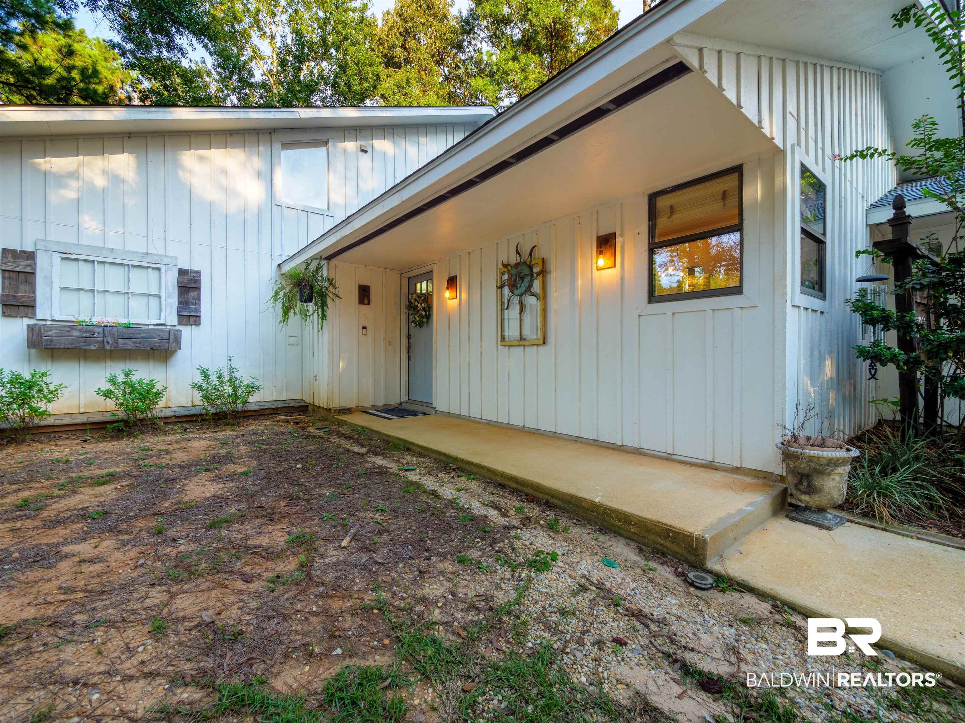 494 Ridgewood Drive Daphne, AL 36526 - Photo 7 of 40 Entrance to property with a patio
