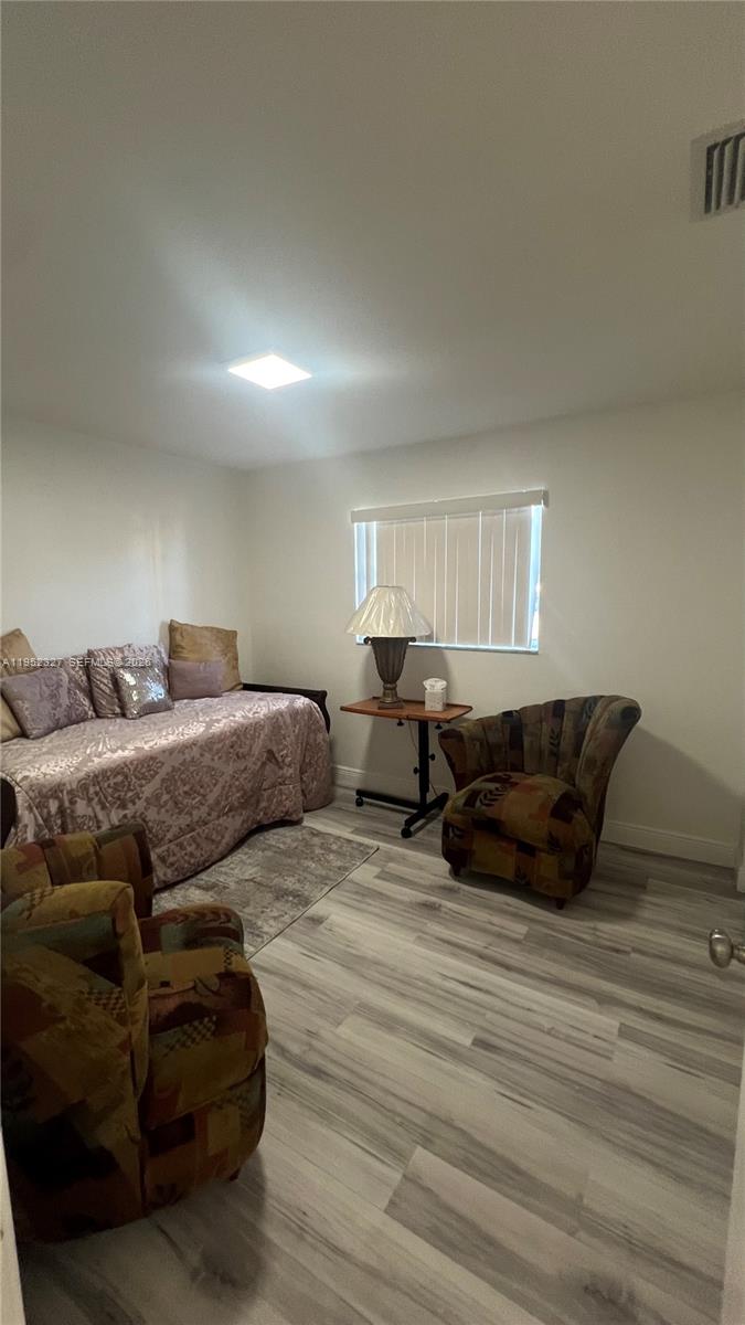 11920 Southwest 191st Terrace Miami, FL 33177 - Photo 7 of 10 a living room with furniture