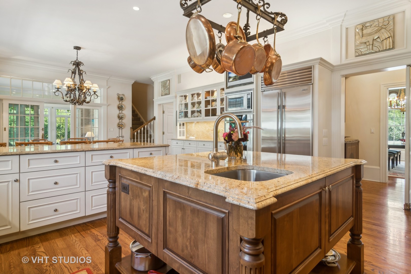 240 Donlea Road Barrington Hills, IL 60010 - Photo 13 of 63 a kitchen with sink and chandelier
