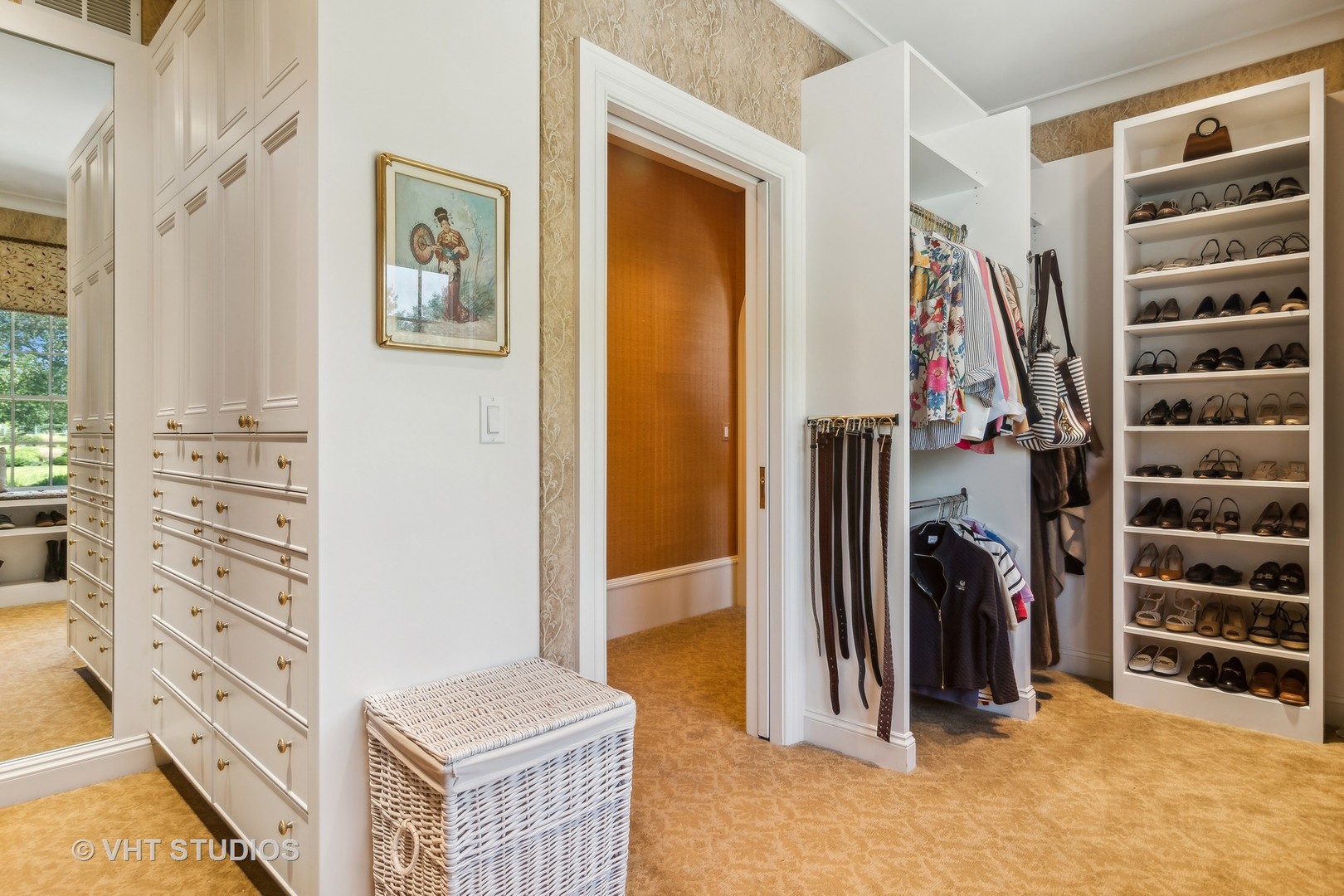 240 Donlea Road Barrington Hills, IL 60010 - Photo 36 of 63 a view of walk in closet with clothes and shoes