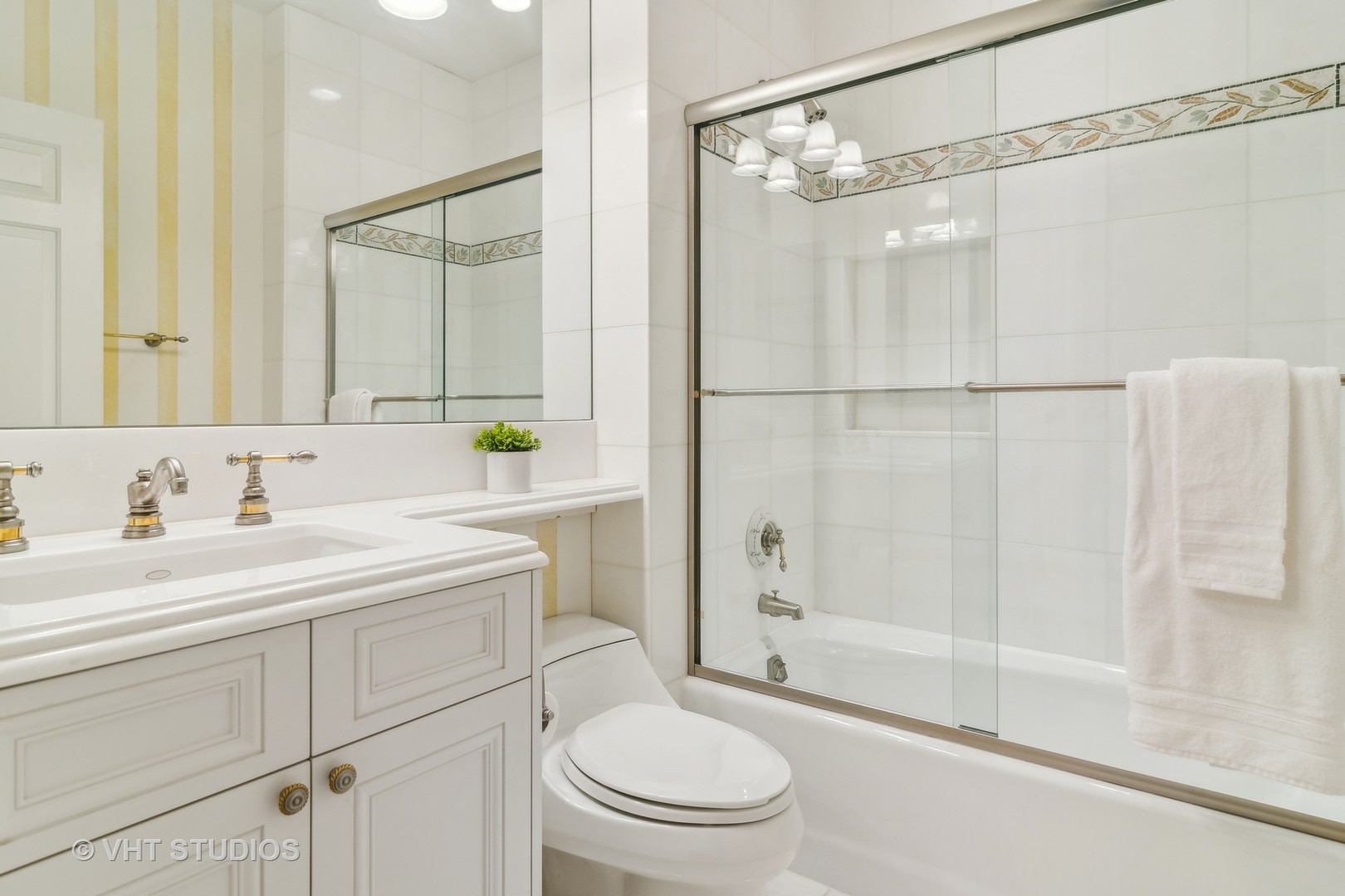 240 Donlea Road Barrington Hills, IL 60010 - Photo 40 of 63 a bathroom with a sink a toilet and shower