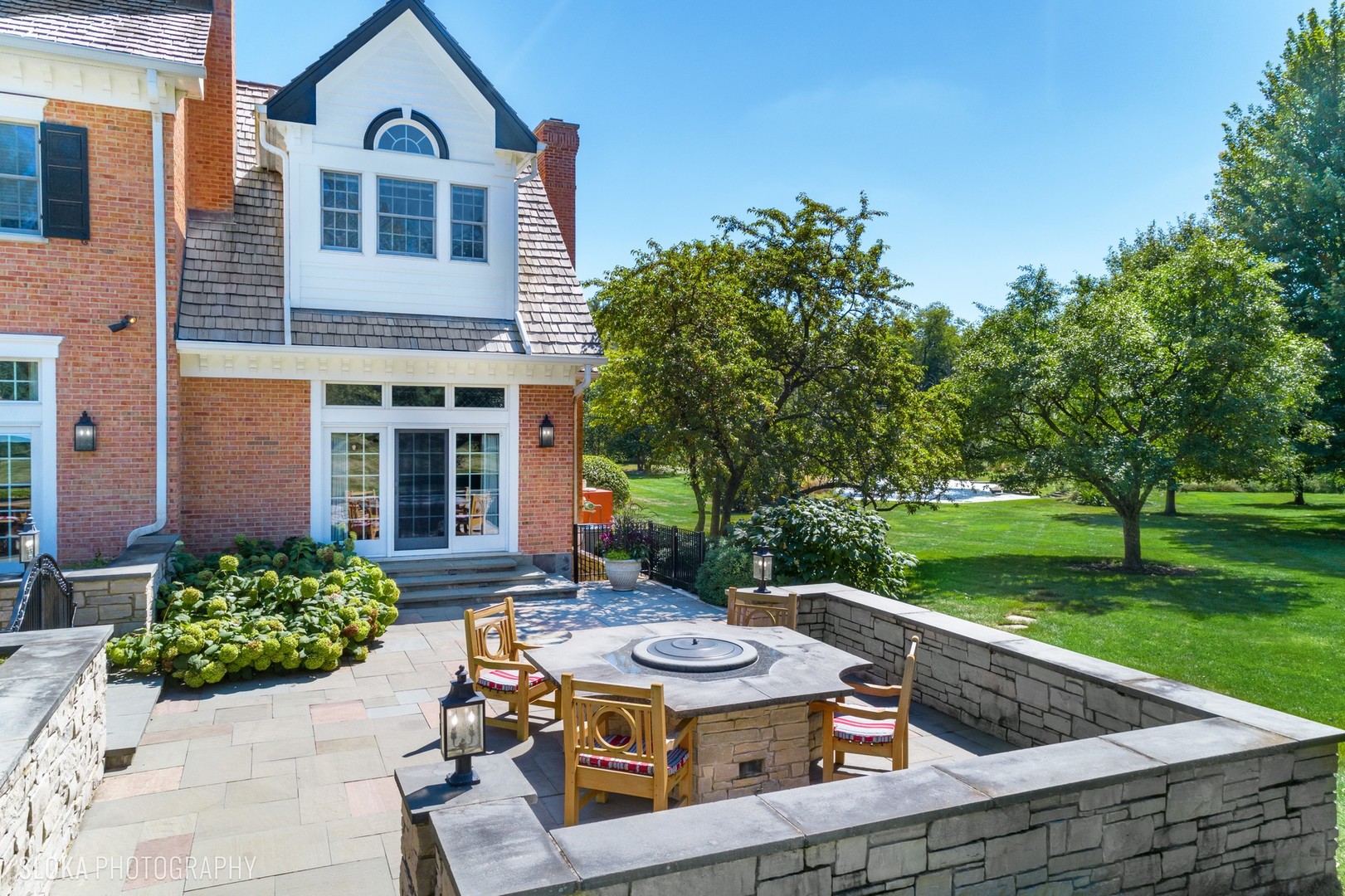 240 Donlea Road Barrington Hills, IL 60010 - Photo 54 of 63 a view of a house with backyard and sitting area