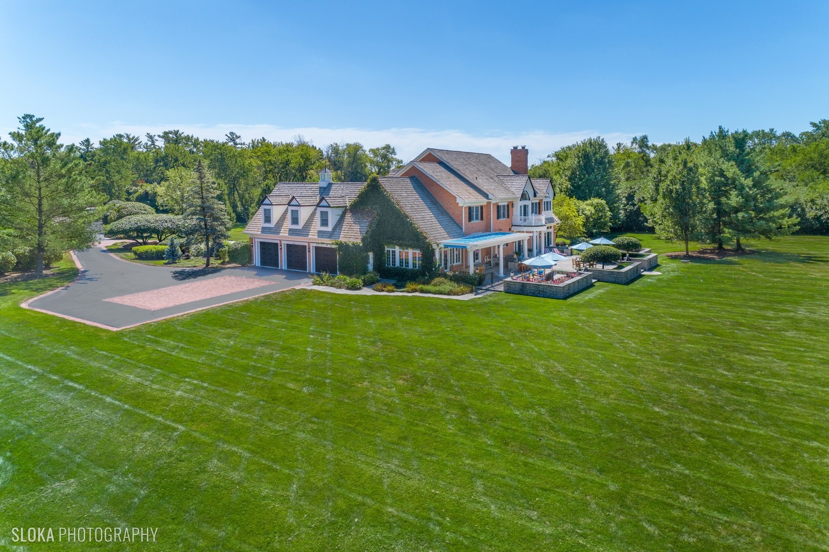 240 Donlea Road Barrington Hills, IL 60010 - Photo 57 of 63 a view of a house with a big yard