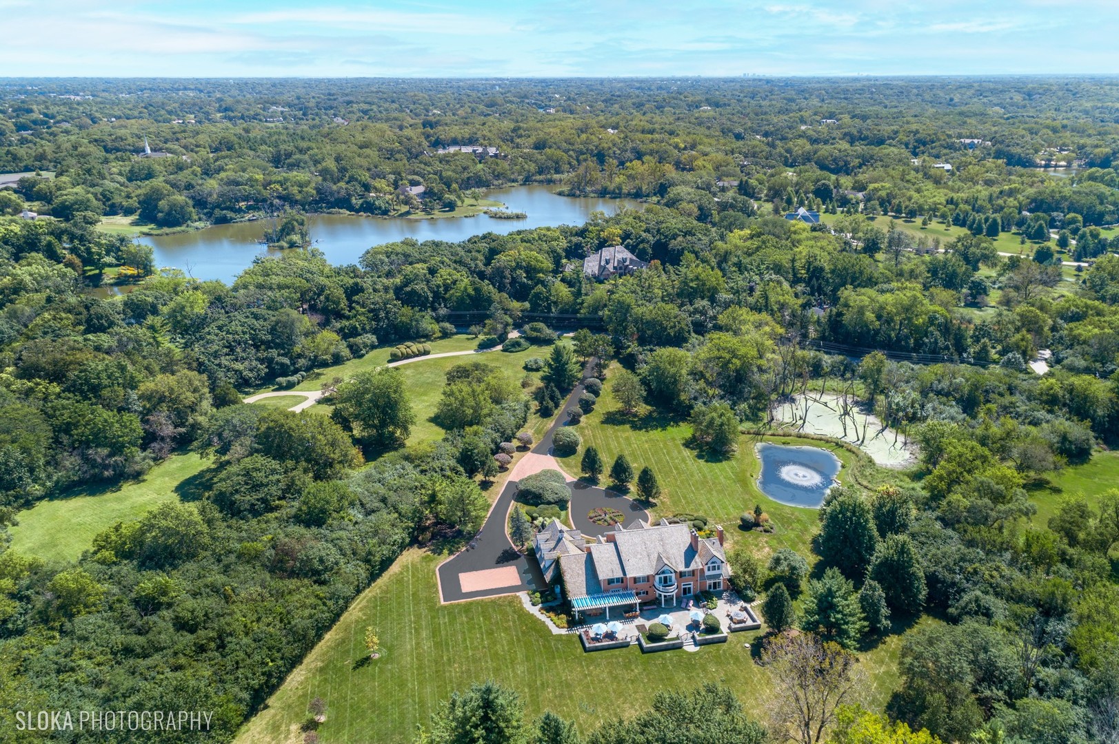 240 Donlea Road Barrington Hills, IL 60010 - Photo 60 of 63 an aerial view of a house with a yard