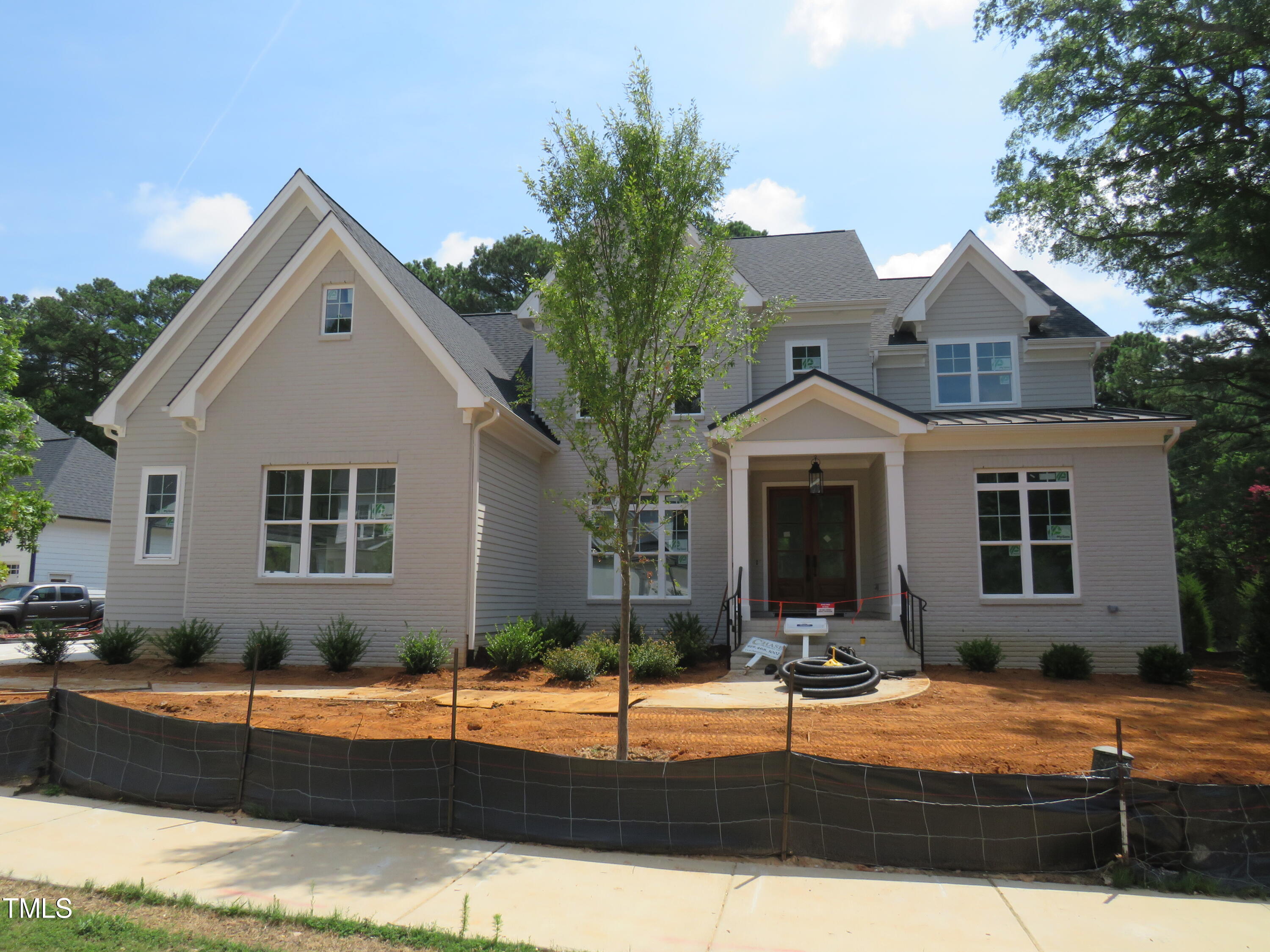 504 Ansley Ridge Cary, NC 27518 - Photo 2 of 3 a view of house with yard