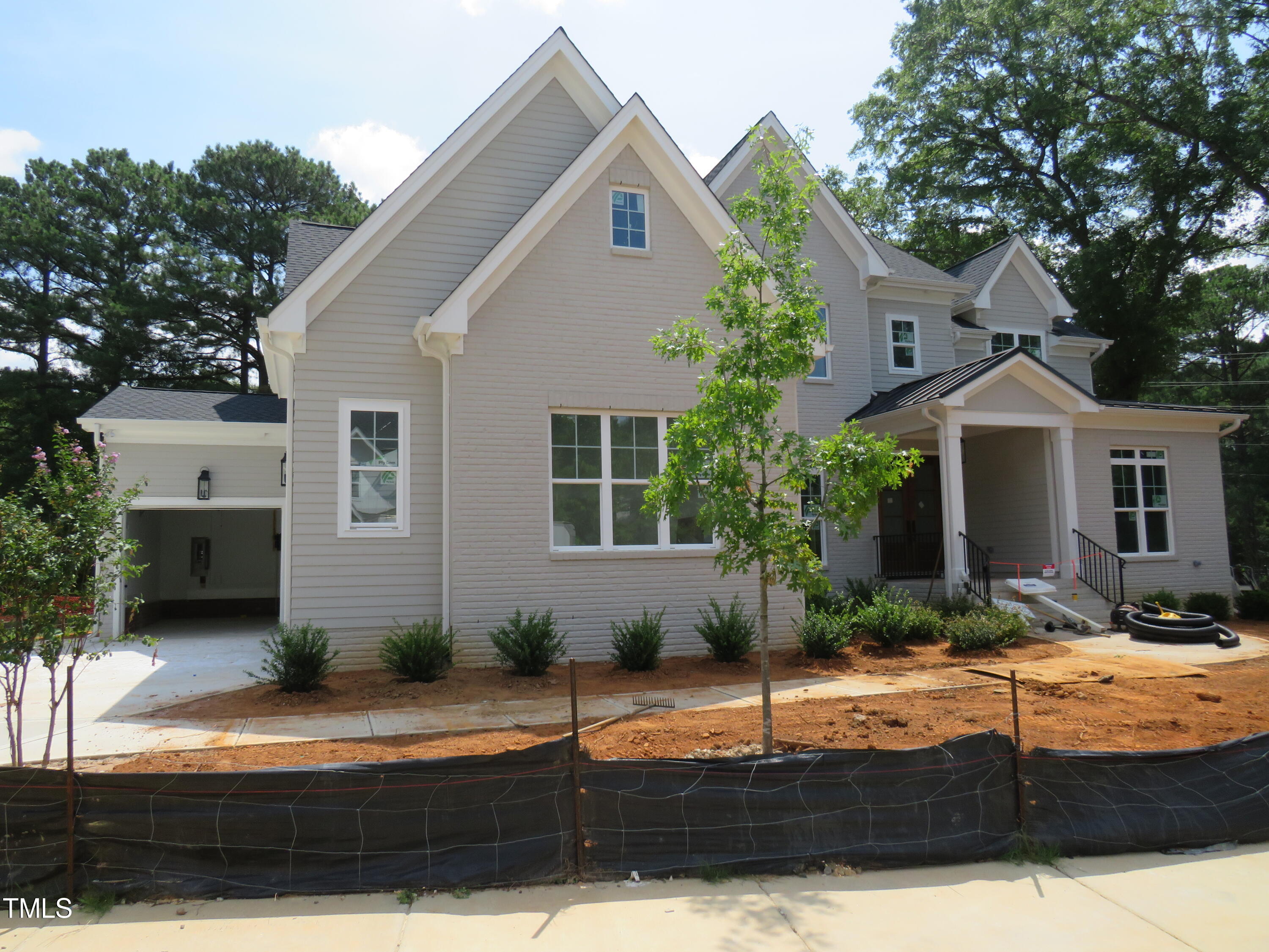 504 Ansley Ridge Cary, NC 27518 - Photo 3 of 3 a front view of a house with garage