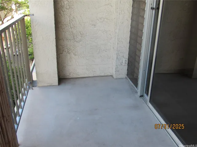 a view of a room with a staircase
