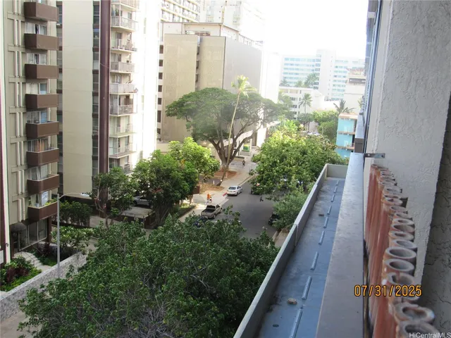 a view of a city with tall buildings