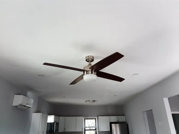 a view of a room with windows