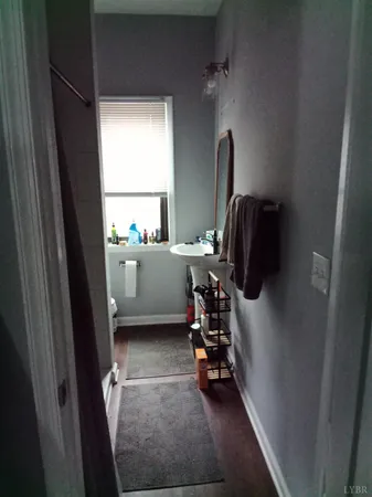 a view of living room with furniture and a window
