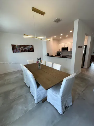 a living room with furniture and a couch