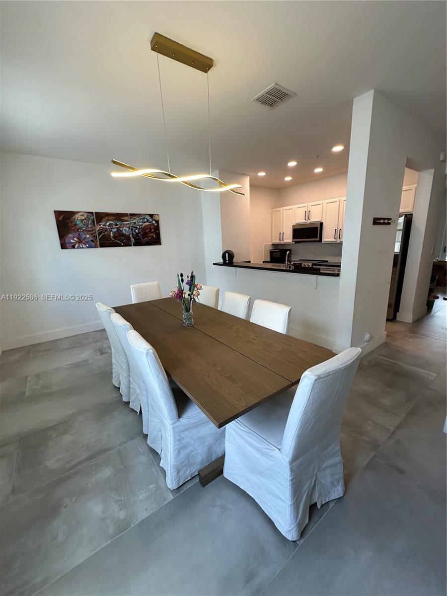 2662 Southwest 118 Road, Unit 2662 Miramar, FL 33025 - Photo 6 of 28 a living room with furniture and a couch