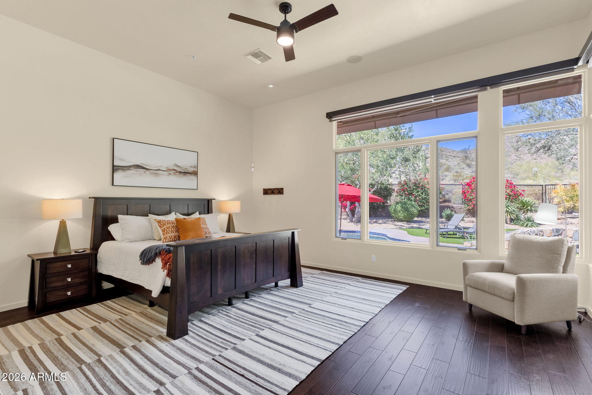 14402 East Wethersfield Road Scottsdale, AZ 85259 - Photo 20 of 57 a bed room with a bed and a couch