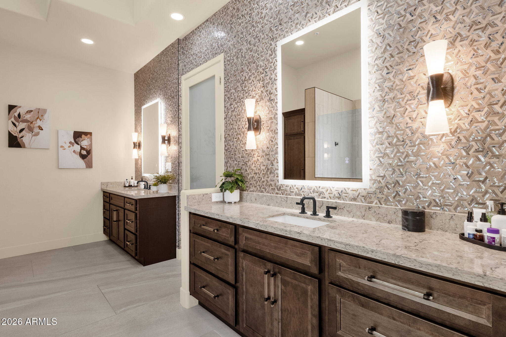 14402 East Wethersfield Road Scottsdale, AZ 85259 - Photo 23 of 57 a bathroom with a granite countertop sink a large mirror and shower
