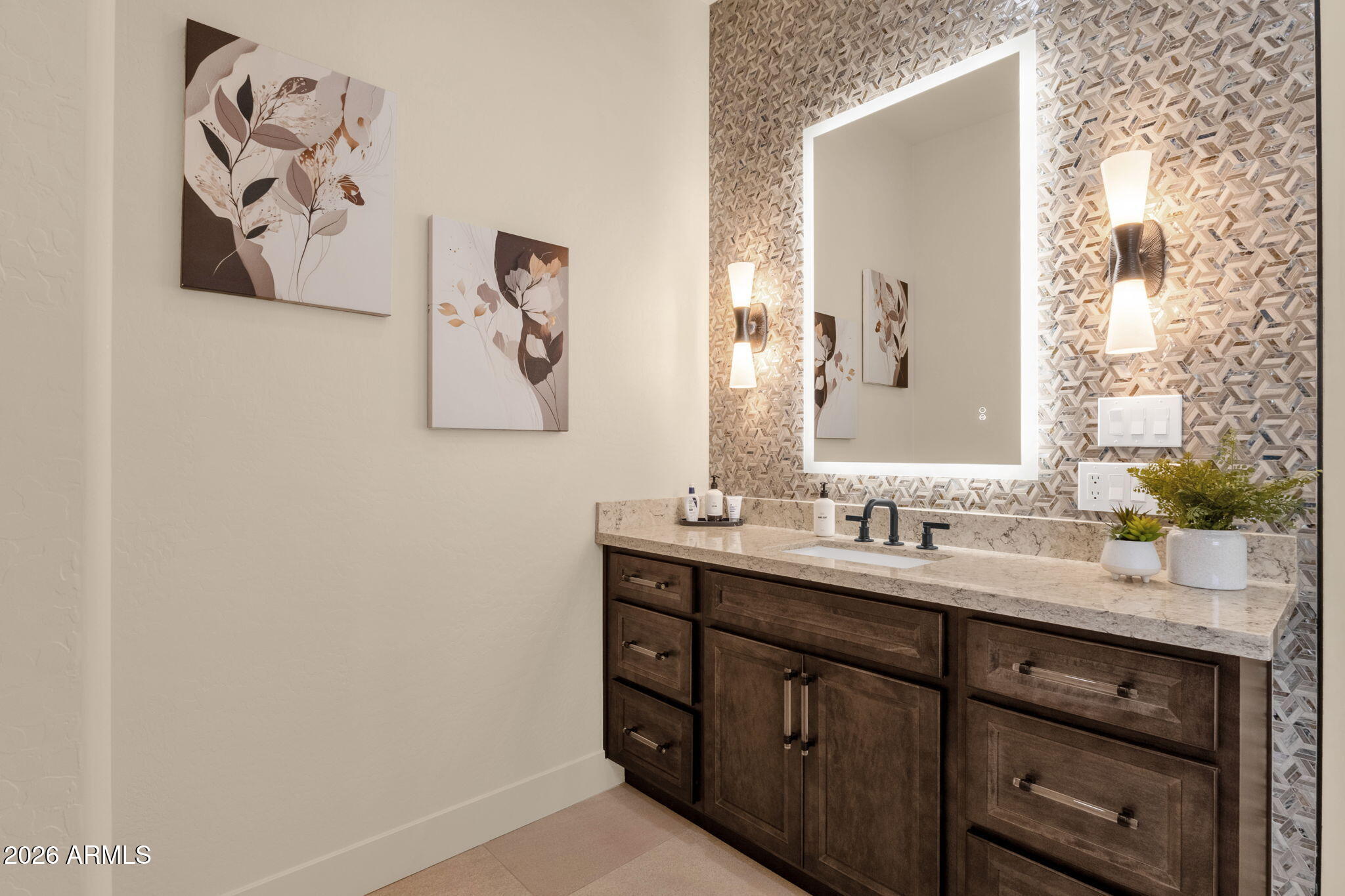 14402 East Wethersfield Road Scottsdale, AZ 85259 - Photo 24 of 57 a bathroom with a sink and a mirror