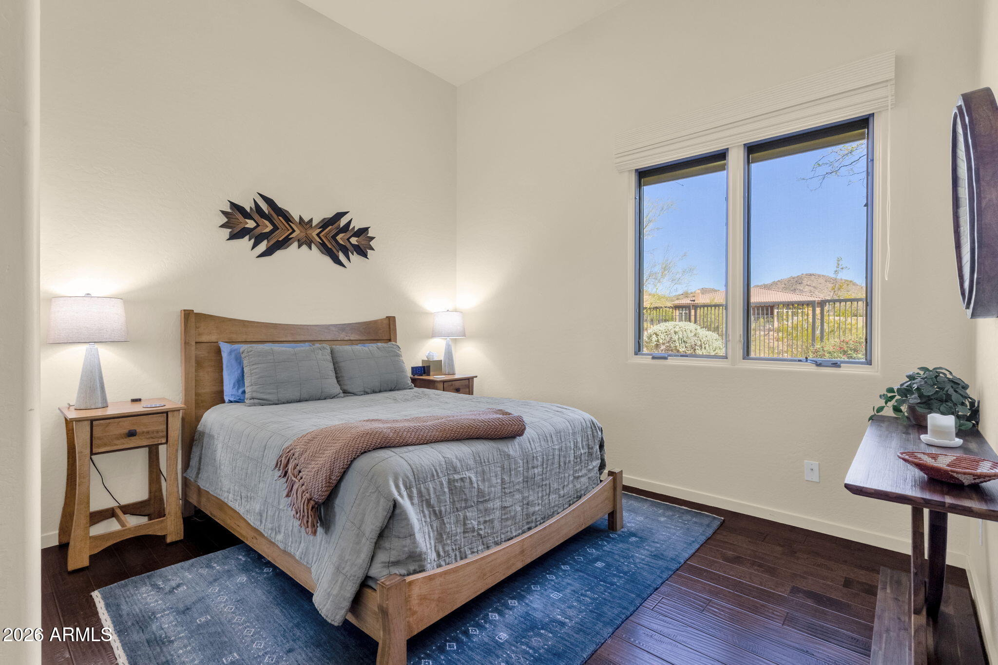14402 East Wethersfield Road Scottsdale, AZ 85259 - Photo 27 of 57 a bedroom with a bed and a window