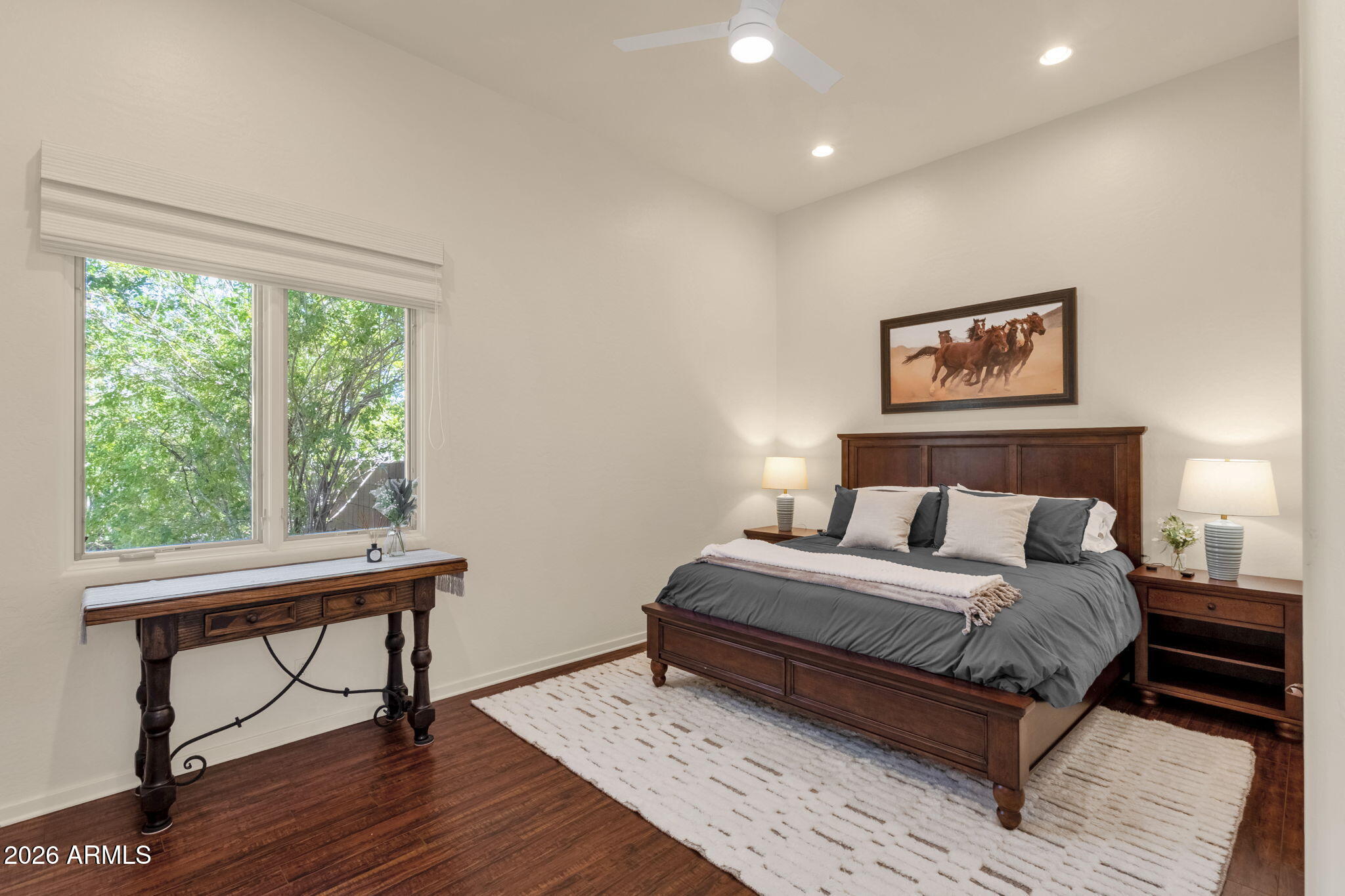 14402 East Wethersfield Road Scottsdale, AZ 85259 - Photo 31 of 57 a bedroom with a bed and a table