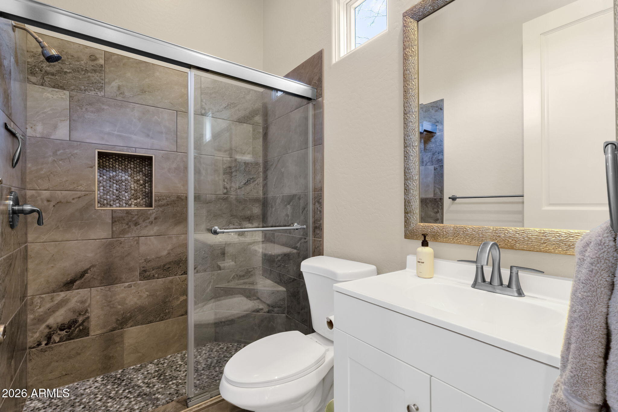 14402 East Wethersfield Road Scottsdale, AZ 85259 - Photo 33 of 57 a bathroom with a sink toilet and shower