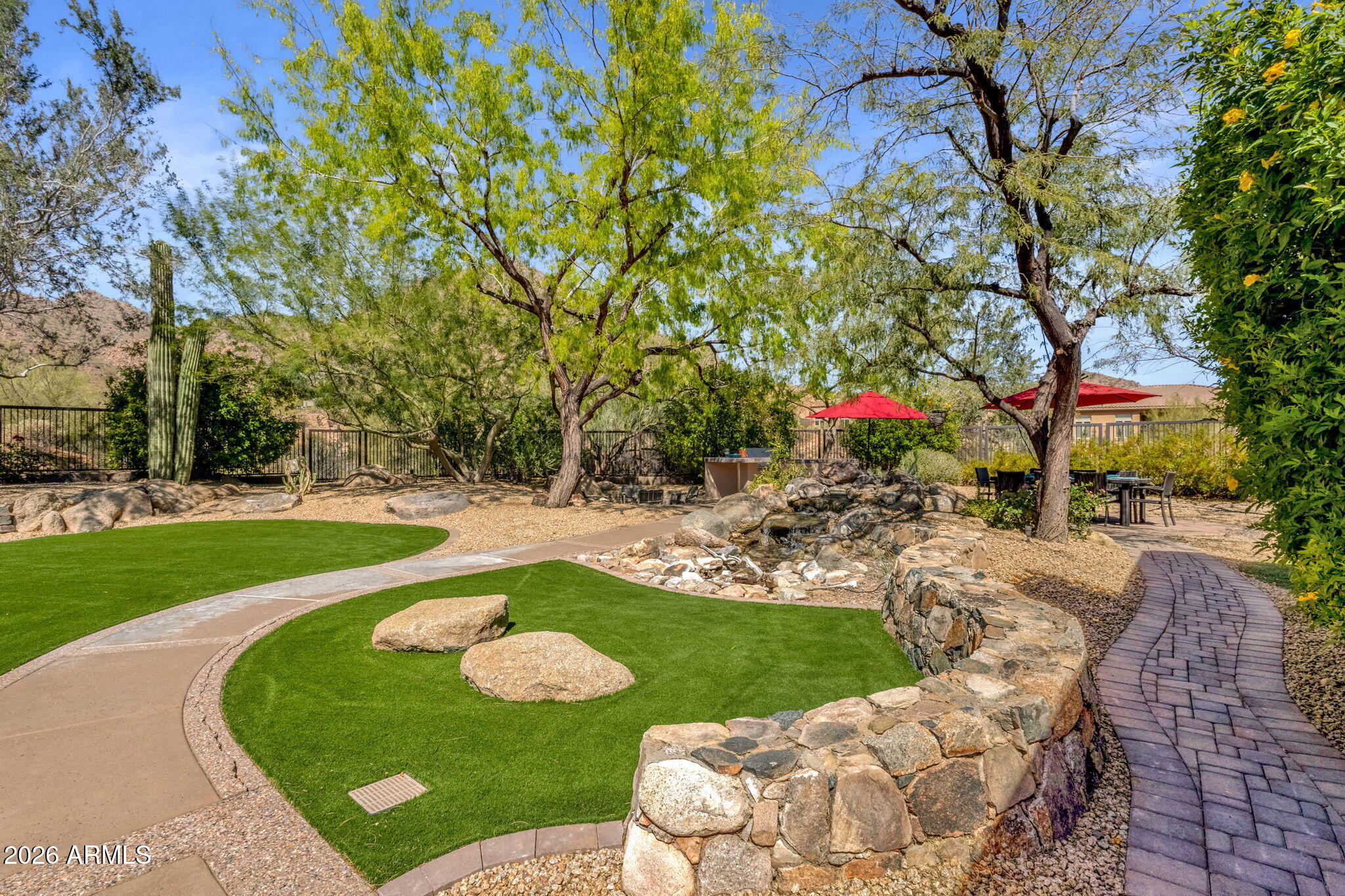 14402 East Wethersfield Road Scottsdale, AZ 85259 - Photo 38 of 57 a view of a play ground in front of the house