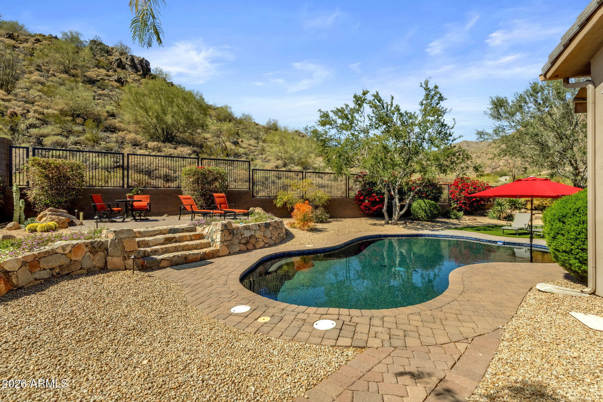14402 East Wethersfield Road Scottsdale, AZ 85259 - Photo 46 of 57 a view of outdoor space yard swimming pool and patio