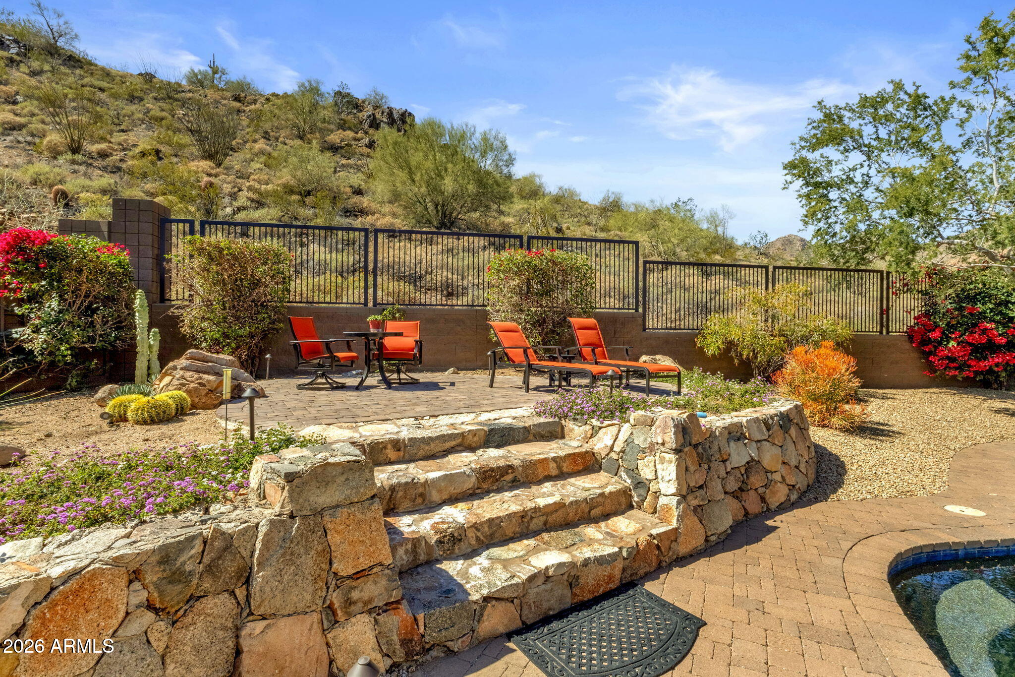 14402 East Wethersfield Road Scottsdale, AZ 85259 - Photo 47 of 57 a view of a swimming pool with a patio