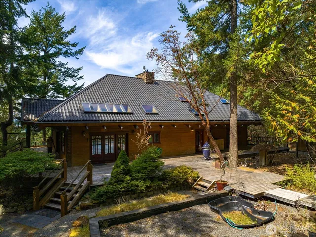 a house with trees in front of it