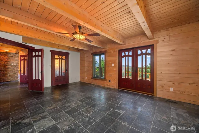 a bathroom with a sink a mirror and shower