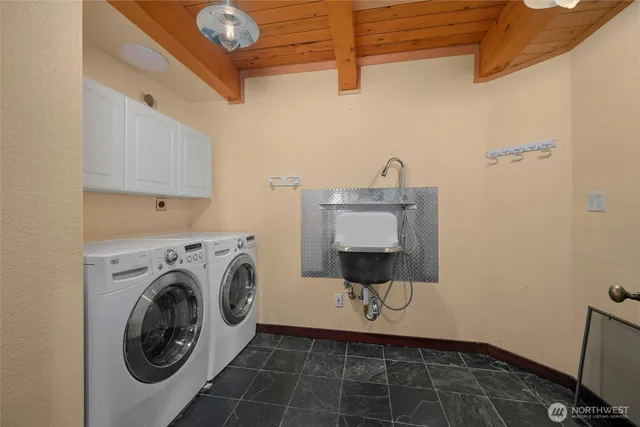 a view of a room with cabinets and window