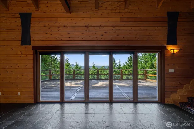 a front view of a building with a yard