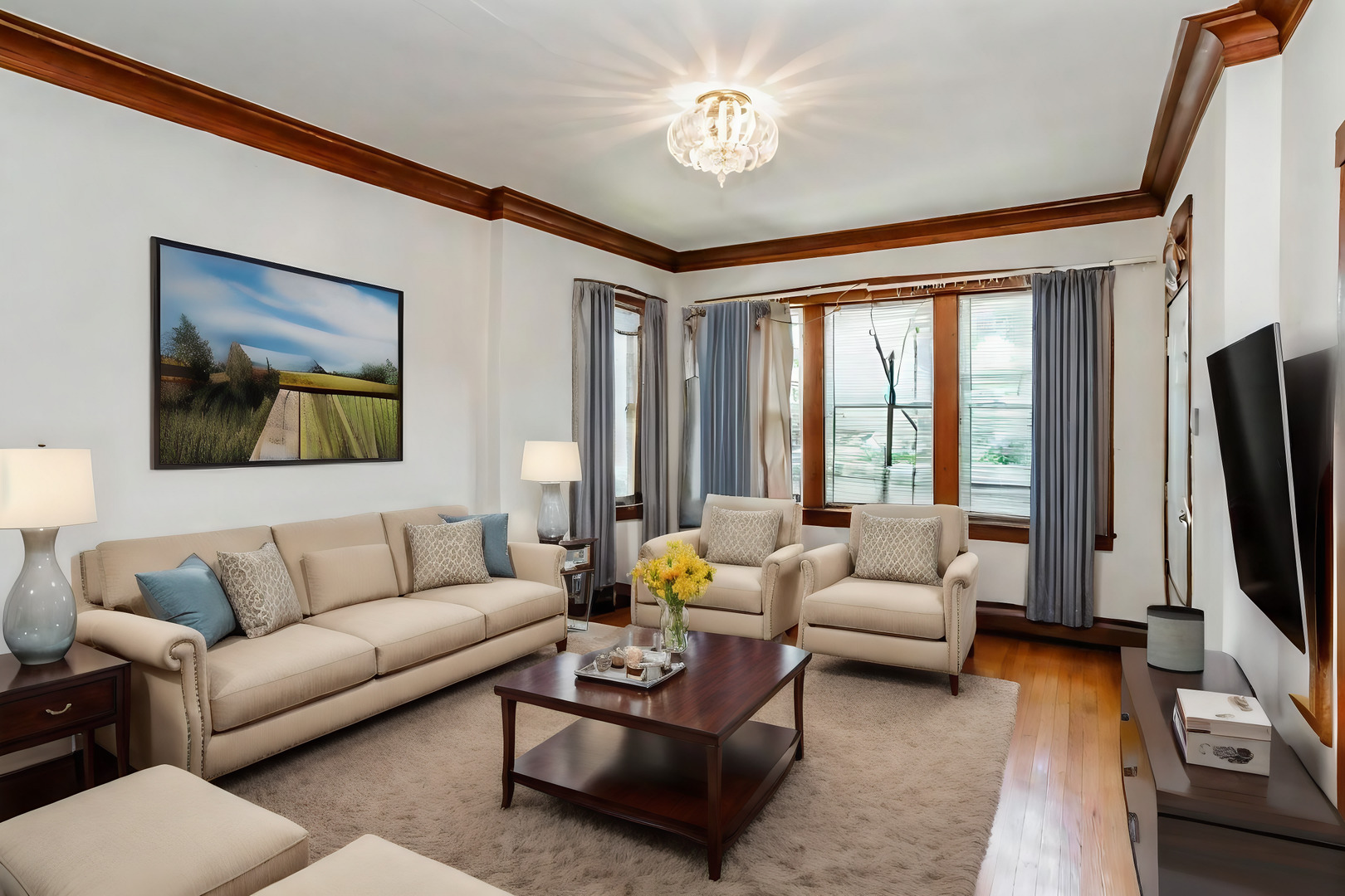 3108 West 54th Place Chicago, IL 60632 - Photo 2 of 7 a living room with furniture flat screen tv and a large window