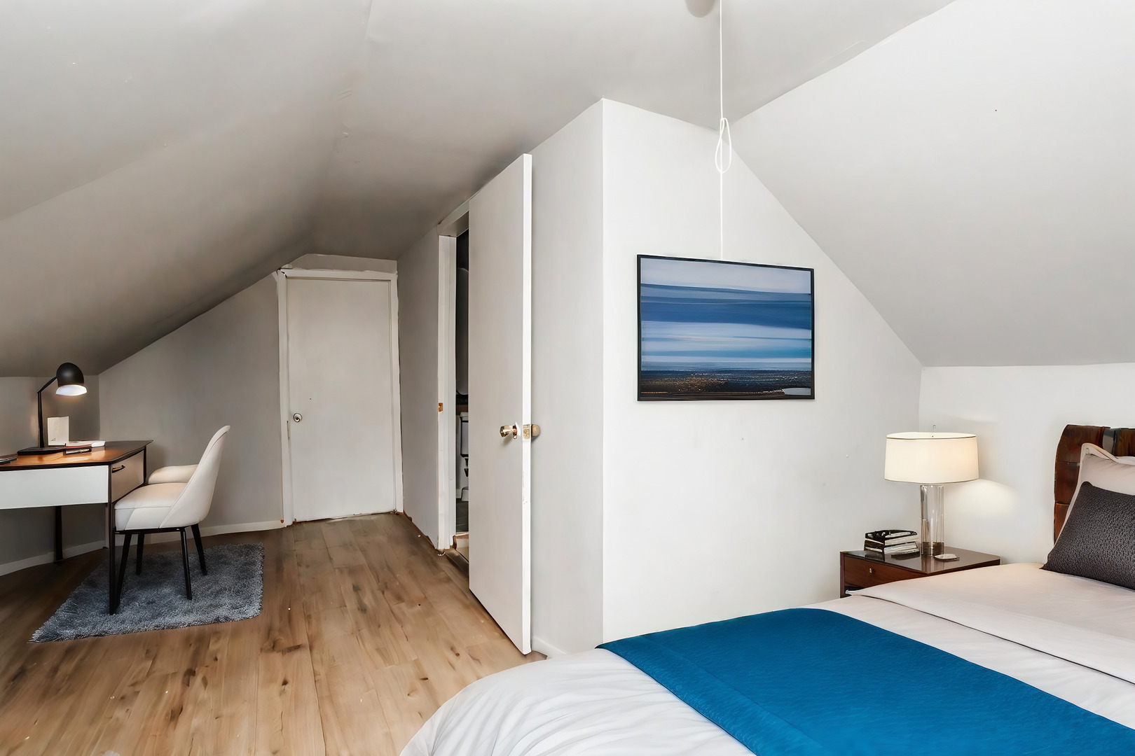 3108 West 54th Place Chicago, IL 60632 - Photo 4 of 7 a bedroom with a bed and a table in it