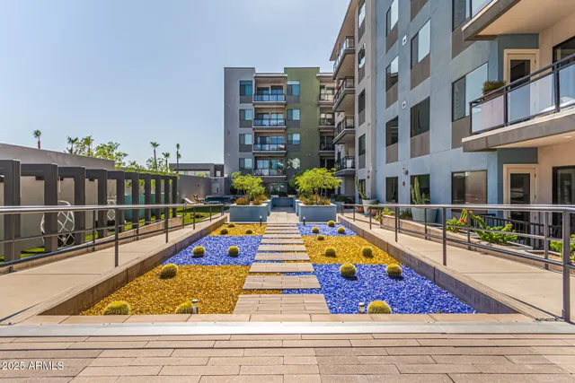 a view of swimming pool with outdoor seating
