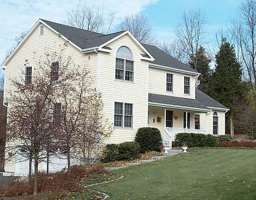 354 Purdy Hill Road Monroe, CT 06468 - Photo 1 of 1 a front view of a house with a yard