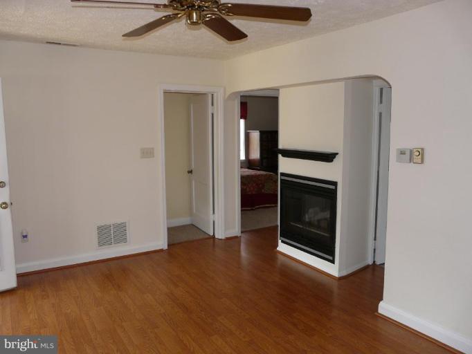 3129 Baybriar Road Dundalk, MD 21222 - Photo 3 of 18 Living Room Showing Gas Fireplace