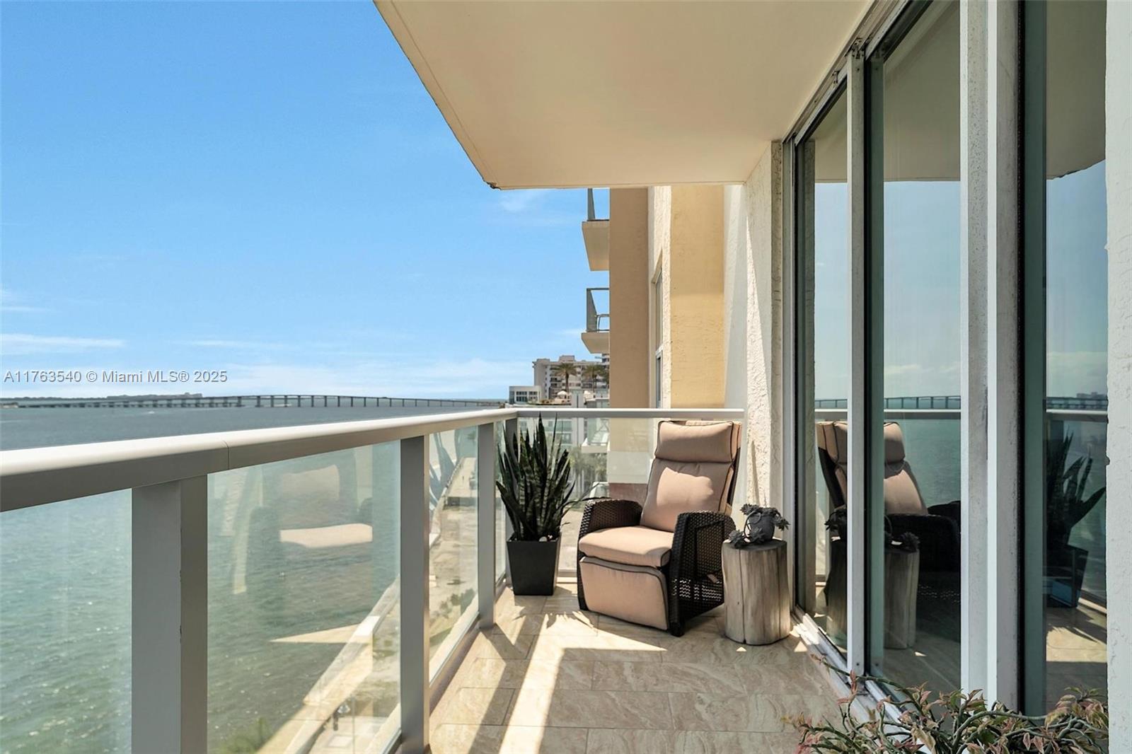 1155 Brickell Bay Drive, Unit 710 Miami, FL 33131 - Photo 8 of 32 a view of balcony with couch