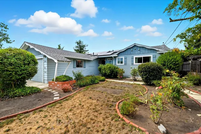 front view of a house with a patio