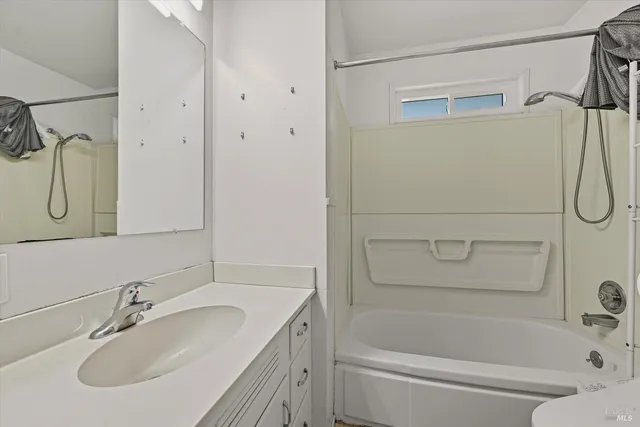 a bathroom with a sink and a bathtub
