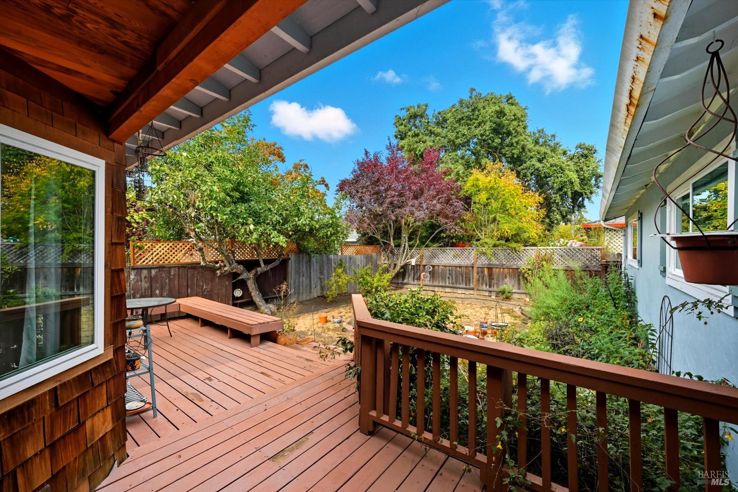 3735 Sacramento Avenue Santa Rosa, CA 95405 - Photo 20 of 24 a view of a balcony with chairs and wooden floor