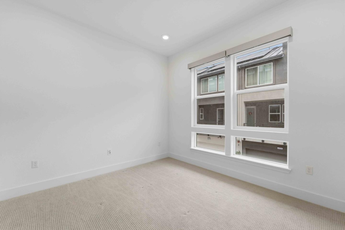 3465 Inspiration Way, Unit 201 Fremont, CA 94538 - Photo 11 of 39 a view of an empty room with a window