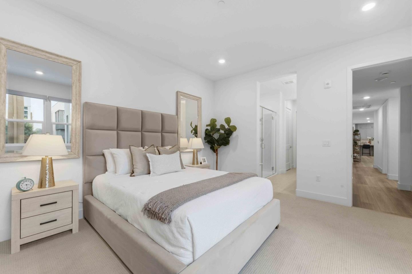 3465 Inspiration Way, Unit 201 Fremont, CA 94538 - Photo 15 of 39 a bedroom with a bed and a lamp