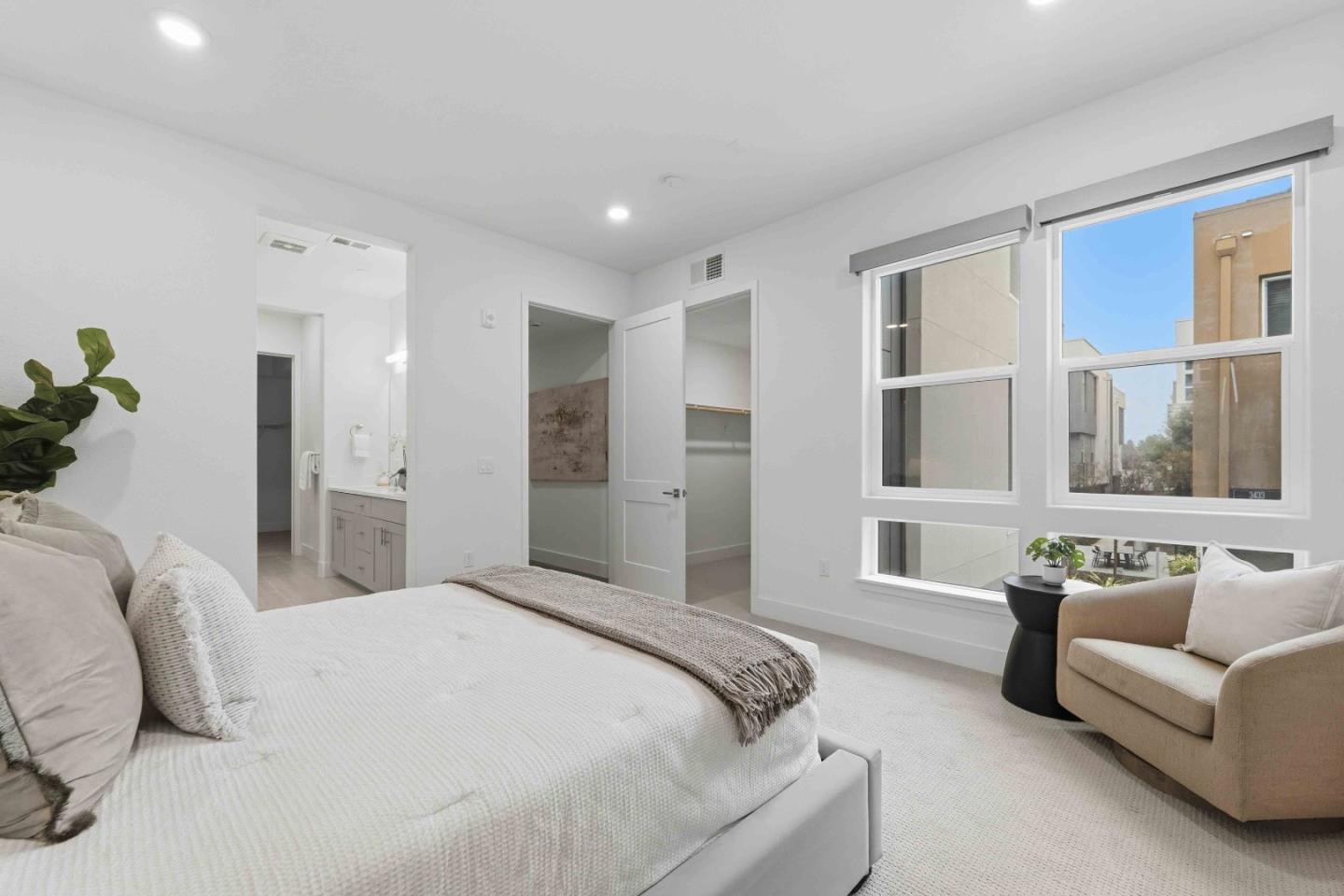 3465 Inspiration Way, Unit 201 Fremont, CA 94538 - Photo 16 of 39 a spacious bedroom with a large bed and a couch