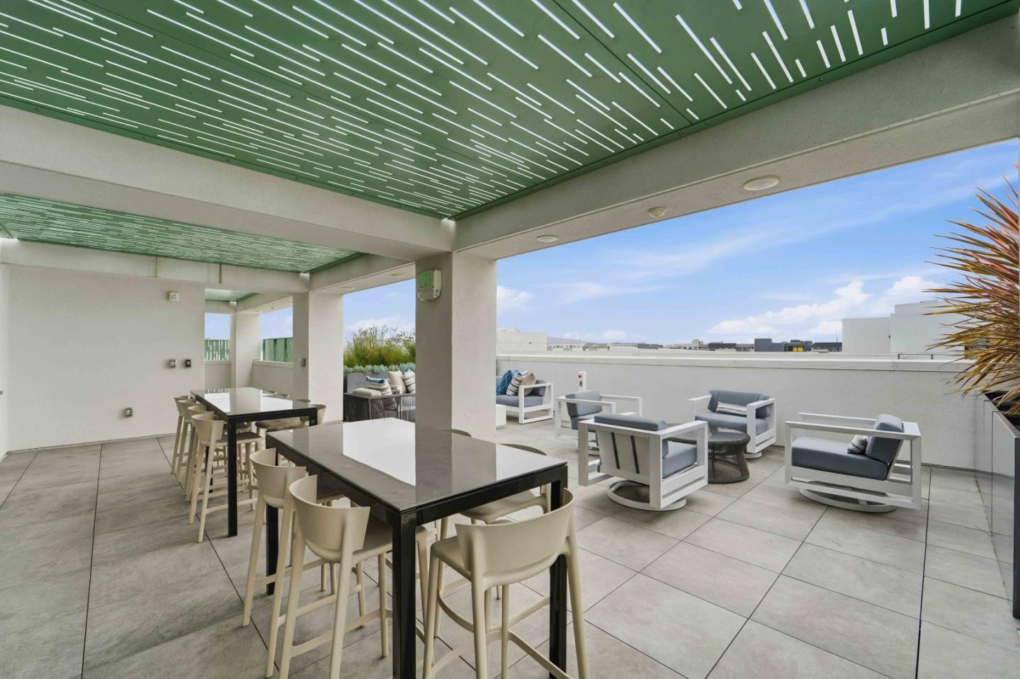 3465 Inspiration Way, Unit 201 Fremont, CA 94538 - Photo 25 of 39 a view of a patio with a table and chairs