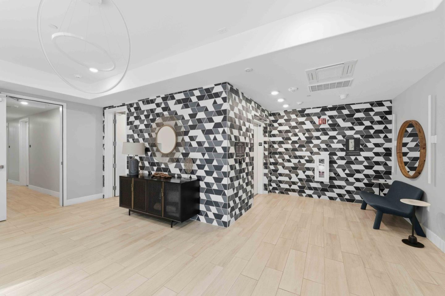 3465 Inspiration Way, Unit 201 Fremont, CA 94538 - Photo 27 of 39 walk in closet with wooden floor