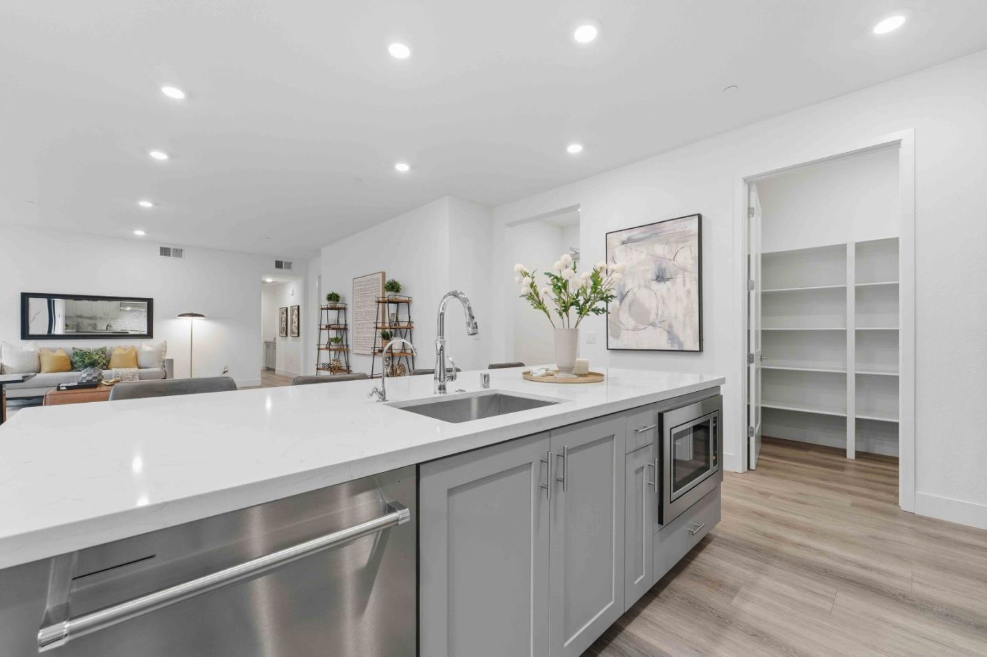 3465 Inspiration Way, Unit 201 Fremont, CA 94538 - Photo 4 of 39 a kitchen with counter top space sink and center island