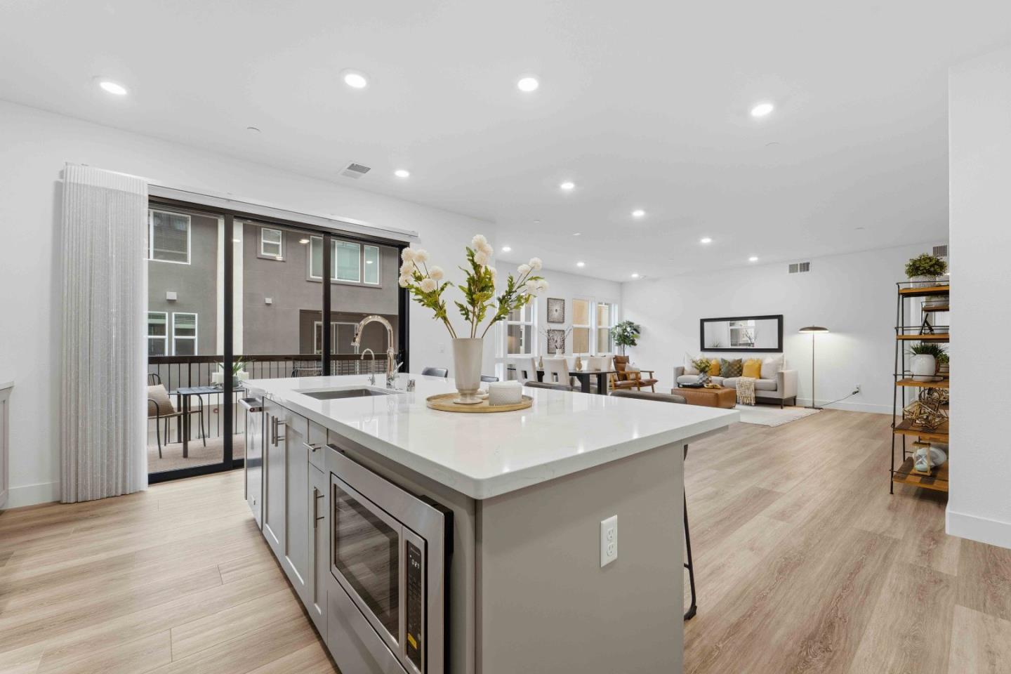 3465 Inspiration Way, Unit 201 Fremont, CA 94538 - Photo 5 of 39 a view of kitchen with sink microwave and refrigerator
