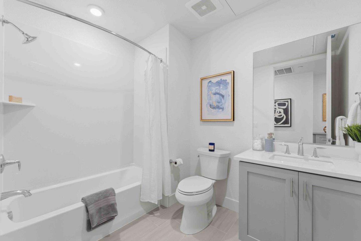 3465 Inspiration Way, Unit 201 Fremont, CA 94538 - Photo 10 of 39 a bathroom with a toilet sink and mirror