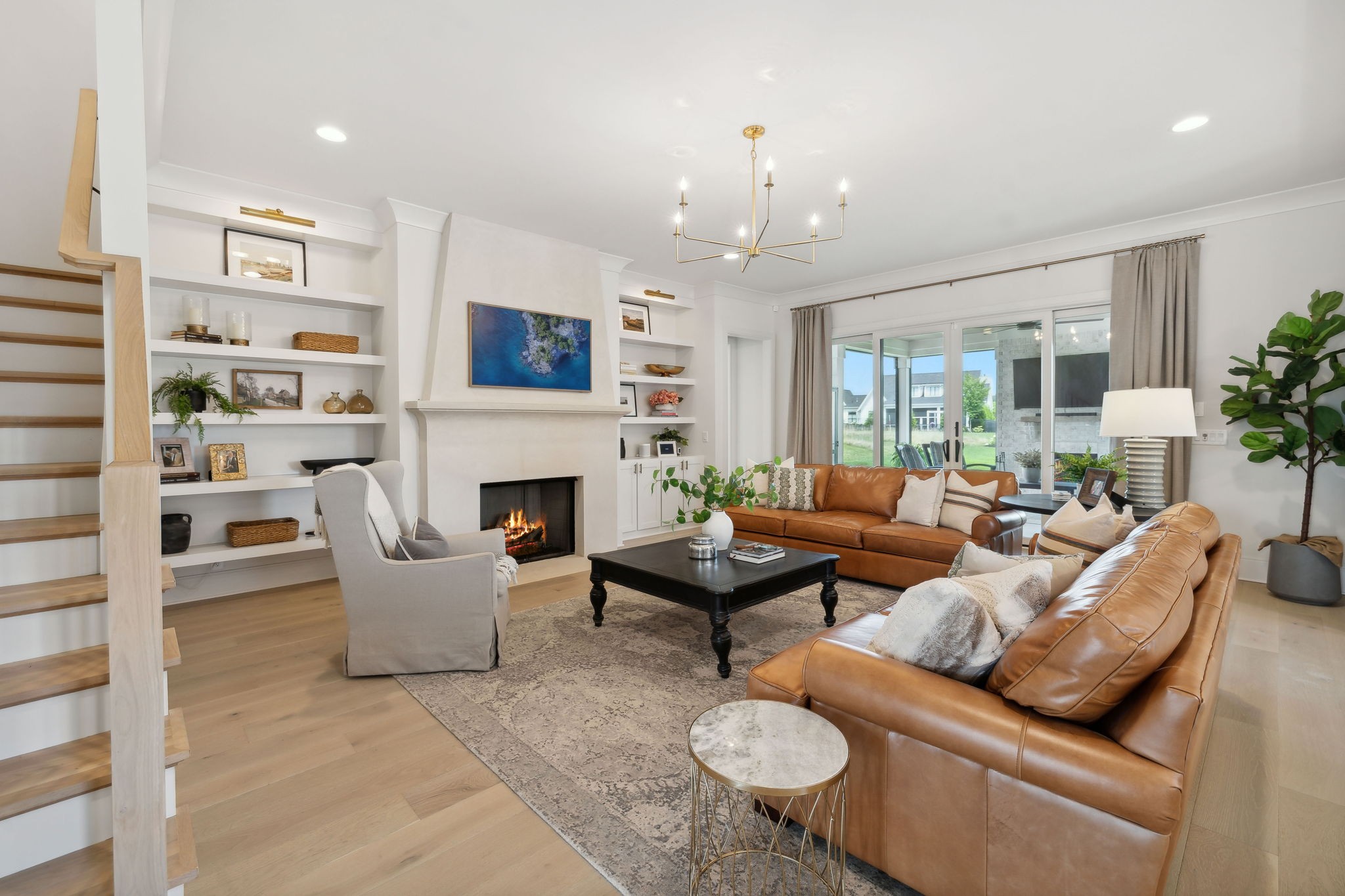6324 Percheron Lane Arrington, TN 37014 - Photo 11 of 53 a living room with furniture a fireplace and a flat screen tv