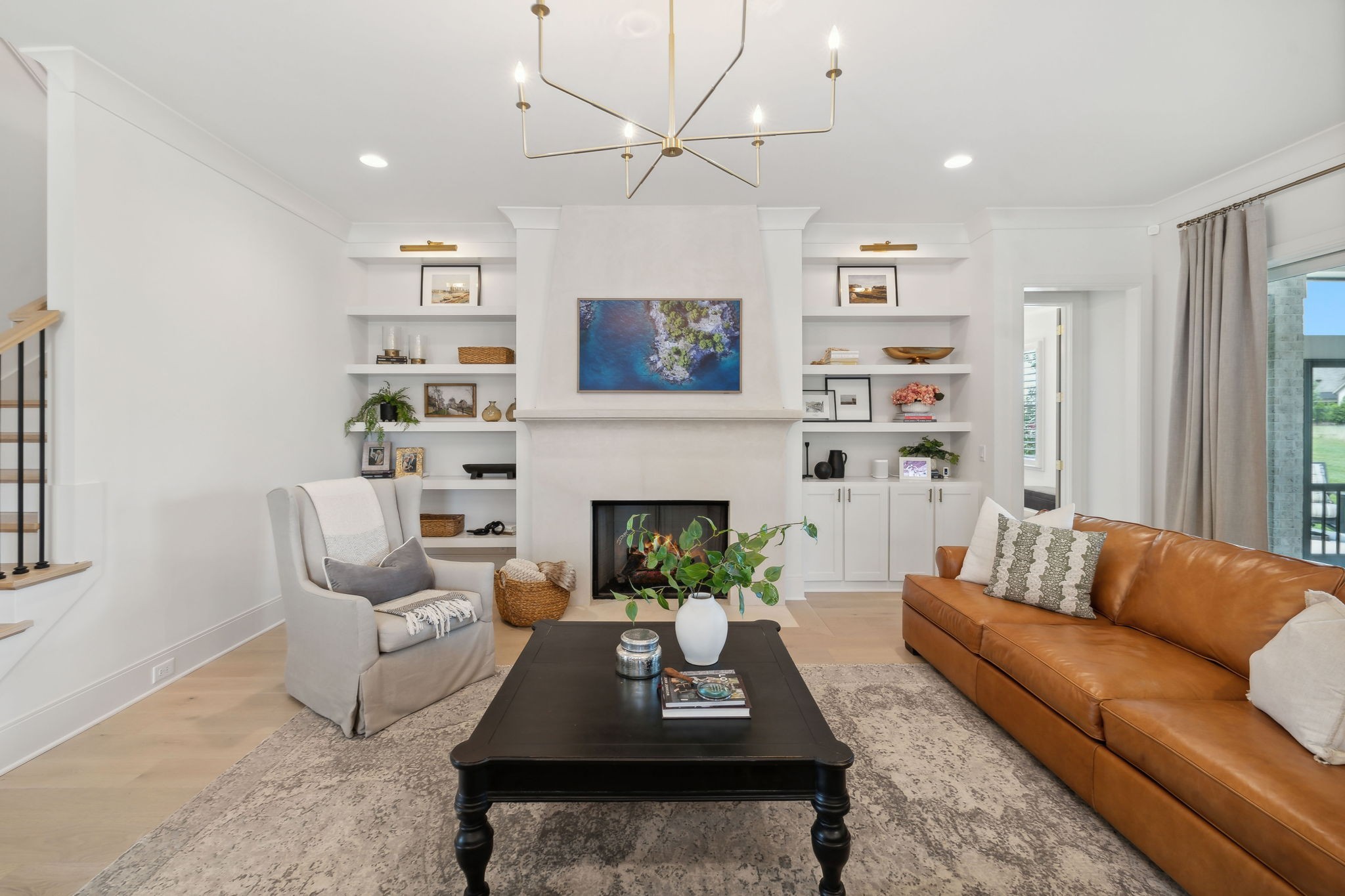 6324 Percheron Lane Arrington, TN 37014 - Photo 12 of 53 a living room with furniture a rug and a fireplace