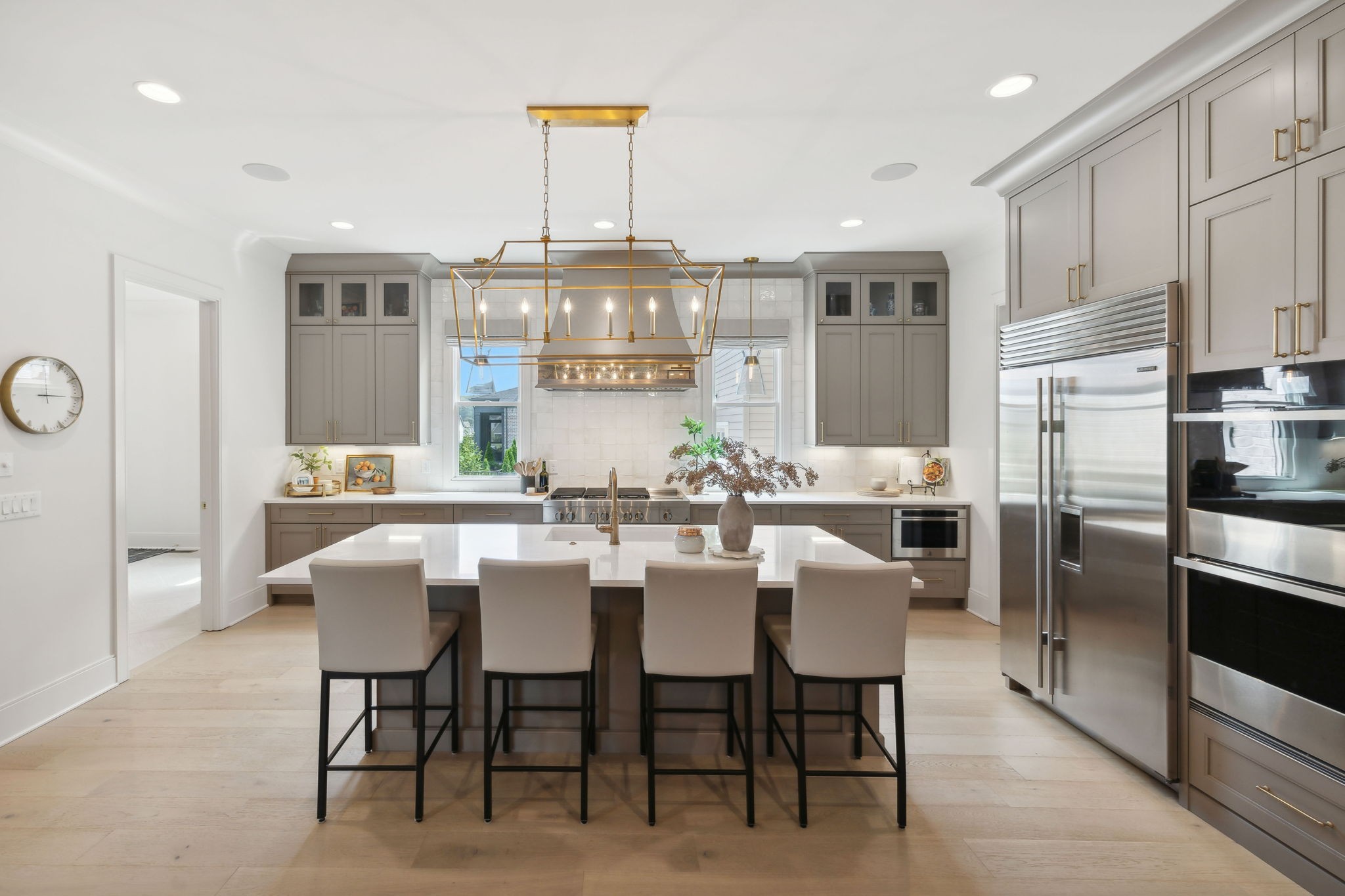 6324 Percheron Lane Arrington, TN 37014 - Photo 14 of 53 a kitchen with stainless steel appliances a dining table chairs and refrigerator