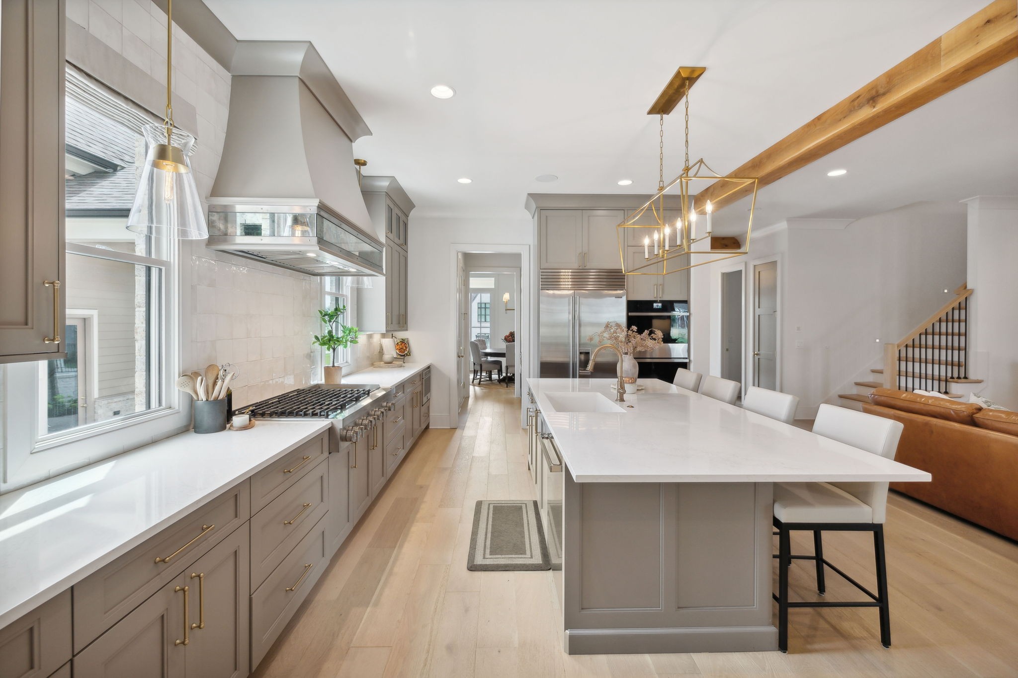6324 Percheron Lane Arrington, TN 37014 - Photo 16 of 53 a large white kitchen with a large window and stainless steel appliances